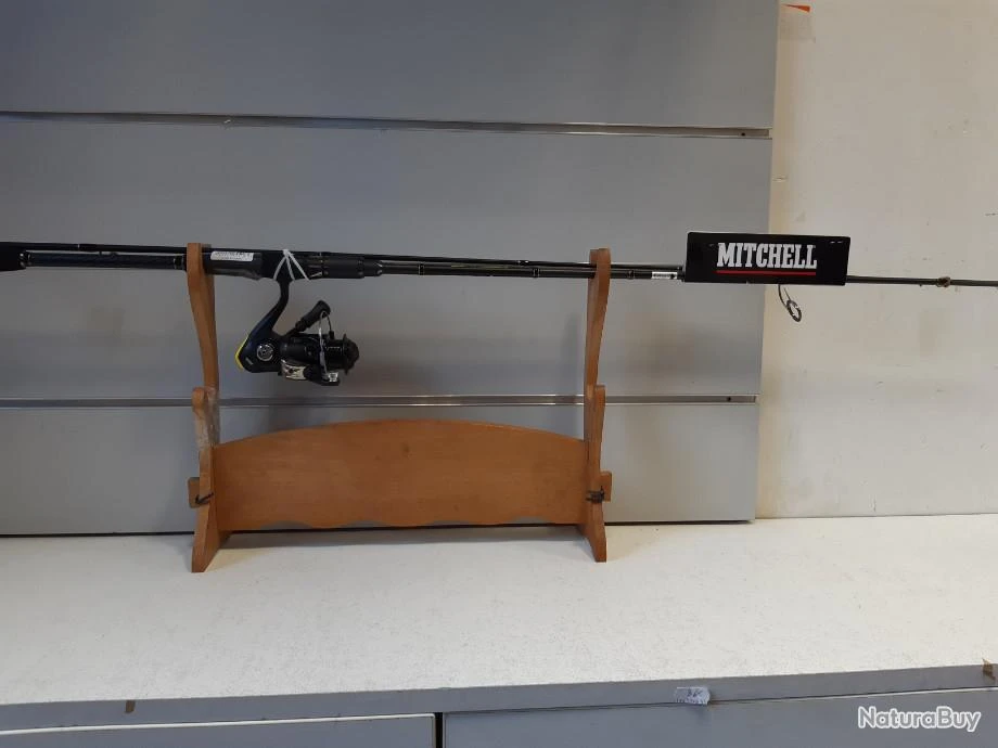5669 CANNE MITCHELL TRAXX SPINNING 2.40M +MOULINET NEUF